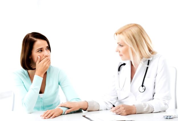 healthcare and medical concept — doctor with patient in hospital