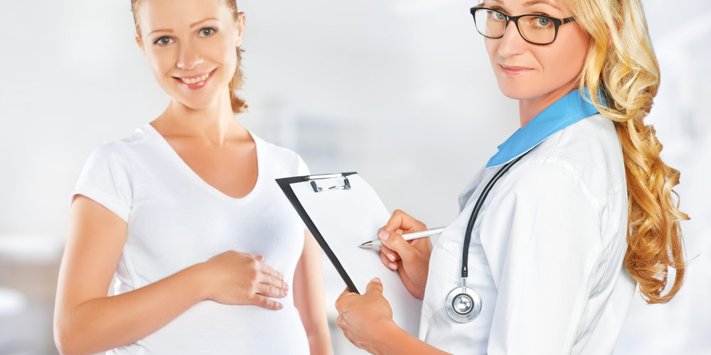 Pregnant woman on reception at doctor